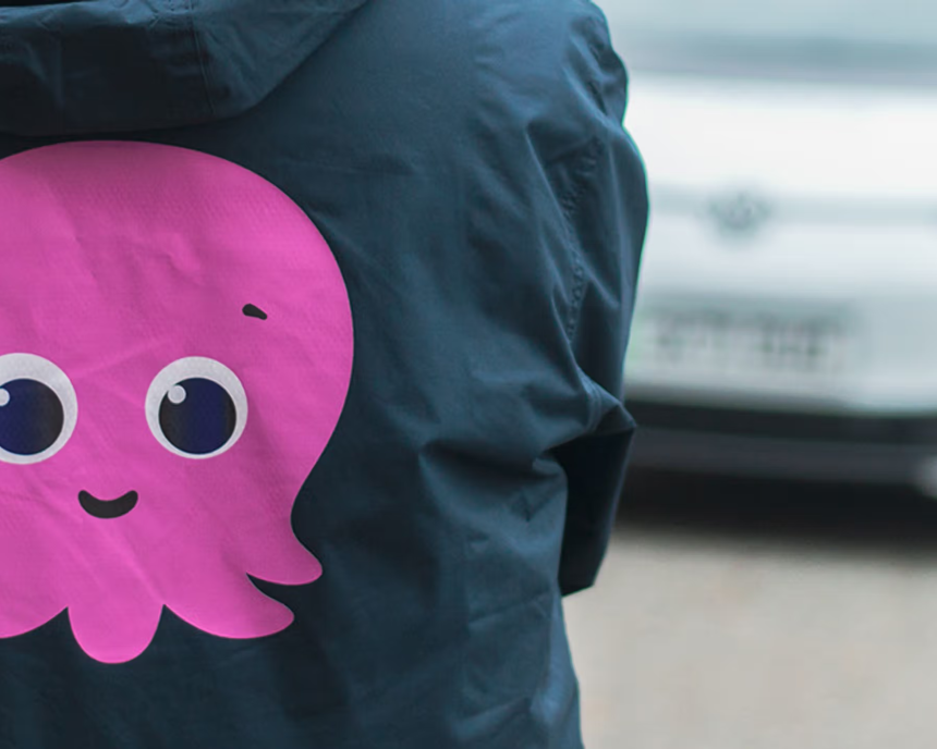 EV in the background with a constantine hoodie in front