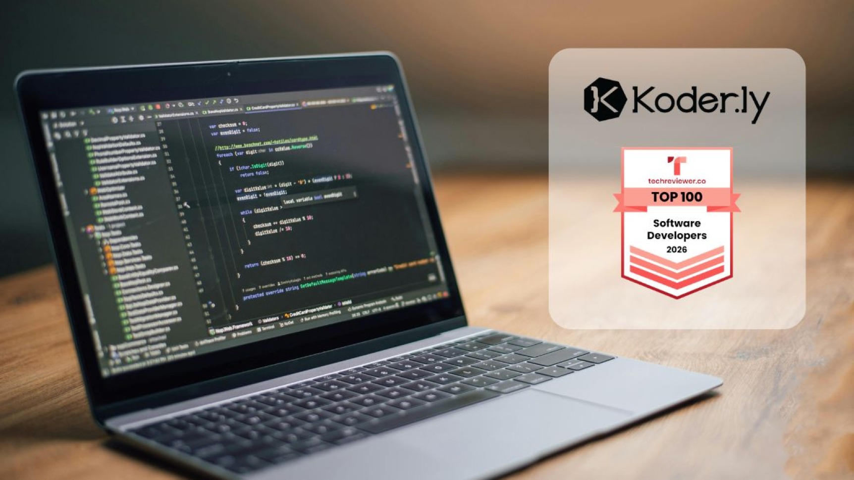 Laptop on the left with code, on the right is Koderly's logo and a Top 100 Software Development 2026 badge.